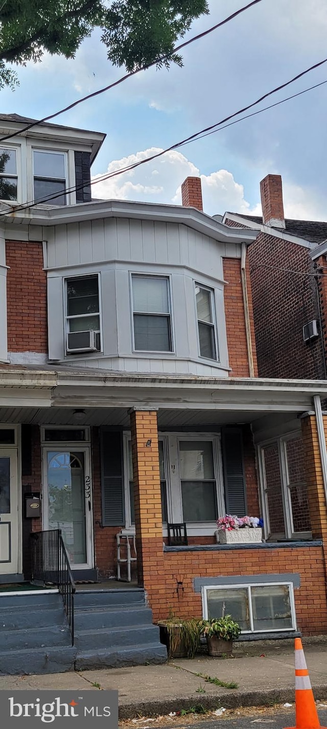 multi unit property featuring covered porch