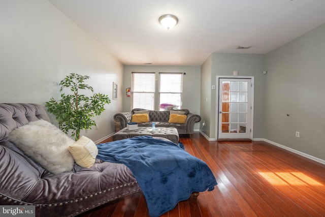 bedroom featuring dark hardwood / wood-style flooring