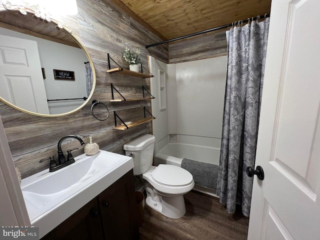 full bathroom with wood ceiling, vanity, wooden walls, toilet, and shower / bath combo with shower curtain