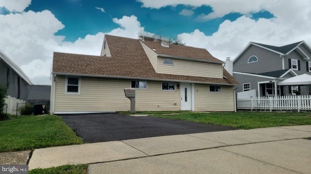 back of property with central AC unit