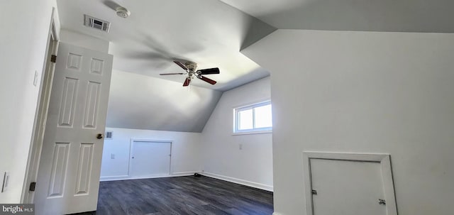 bonus room featuring ceiling fan, dark hardwood / wood-style floors, and vaulted ceiling