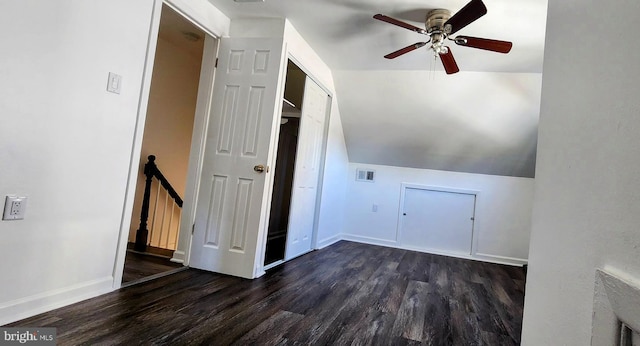 bonus room featuring ceiling fan, lofted ceiling, and dark hardwood / wood-style floors