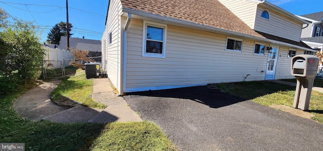 view of home's exterior with central AC