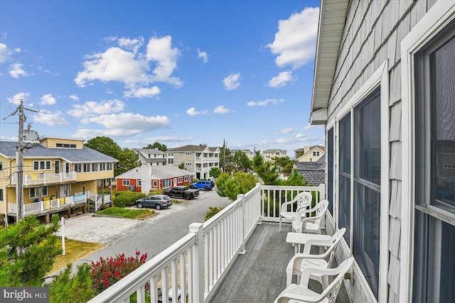 balcony featuring a residential view