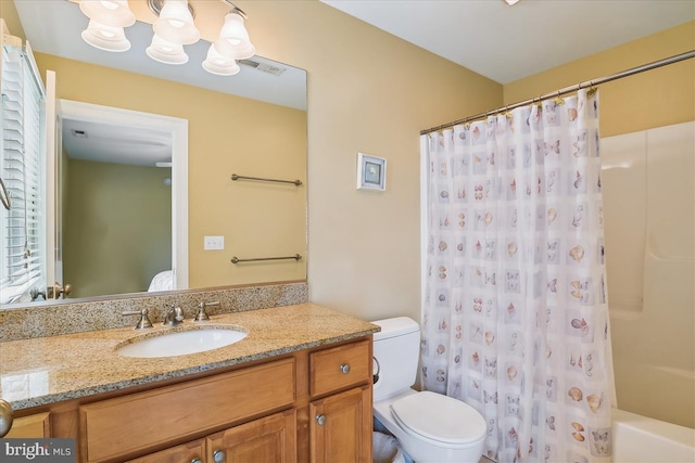 full bath featuring a chandelier, toilet, vanity, visible vents, and shower / bath combo with shower curtain