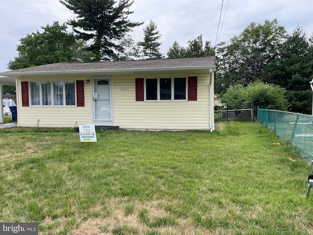 view of front of home with a front yard