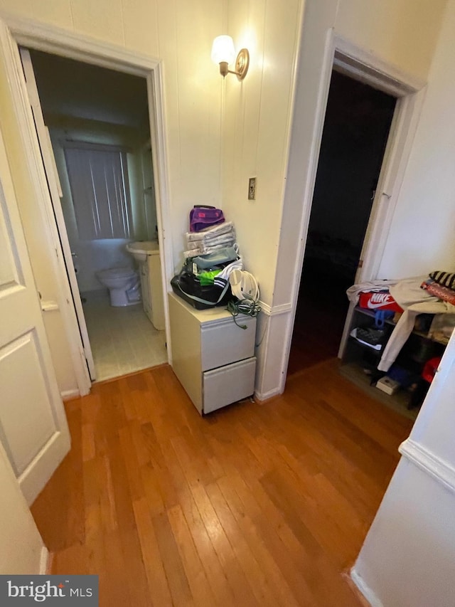 hallway featuring light hardwood / wood-style flooring