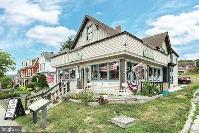 exterior space featuring a lawn