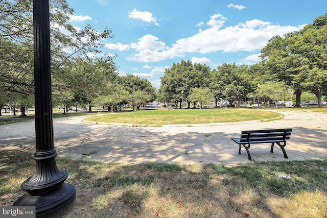 view of home's community with a lawn