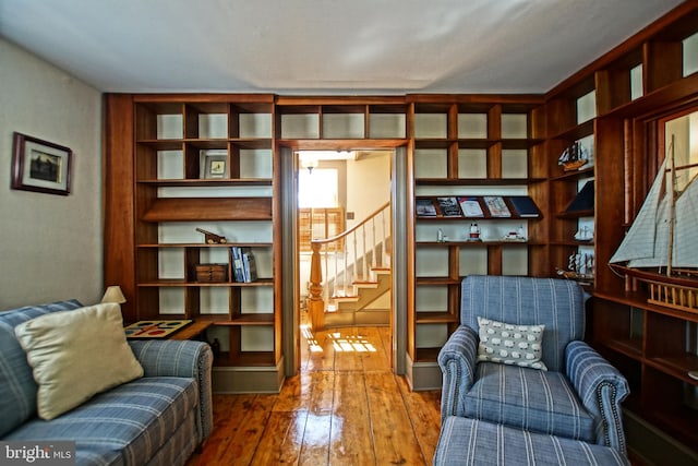 living area with wood-type flooring