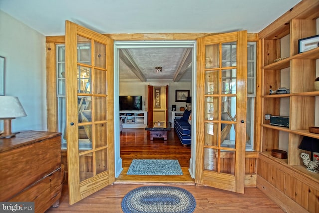 doorway to outside featuring french doors and hardwood / wood-style floors