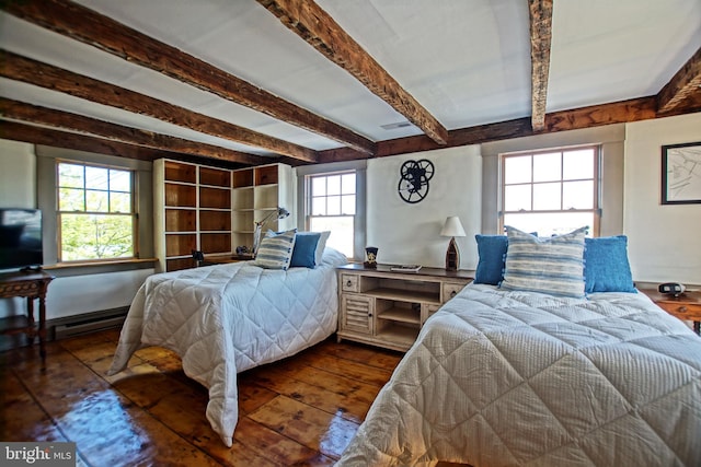 bedroom featuring dark hardwood / wood-style flooring and beamed ceiling