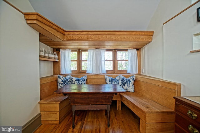 dining room with breakfast area and hardwood / wood-style flooring