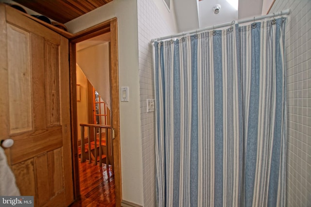 bathroom with curtained shower