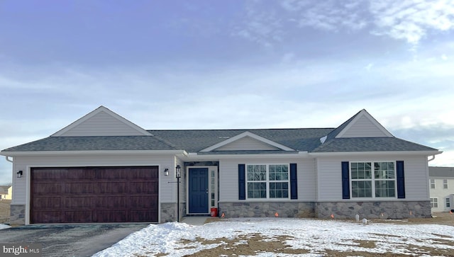 view of front of home featuring a garage