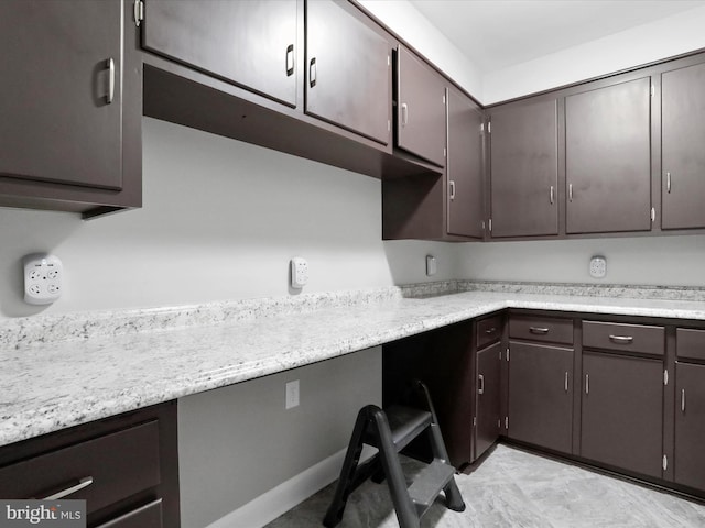 kitchen with dark brown cabinets