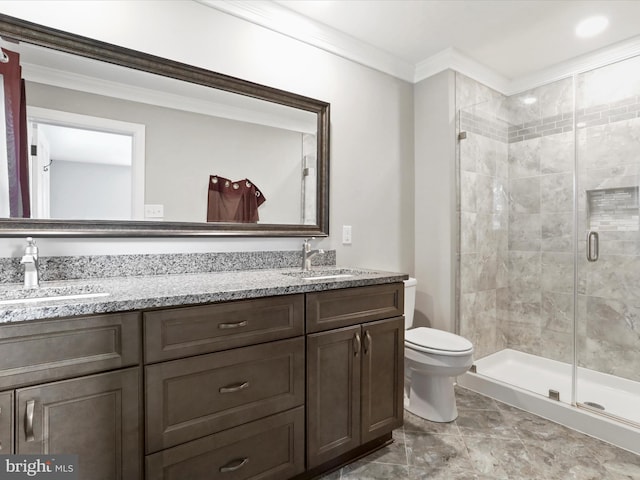 bathroom with crown molding, toilet, vanity, and walk in shower