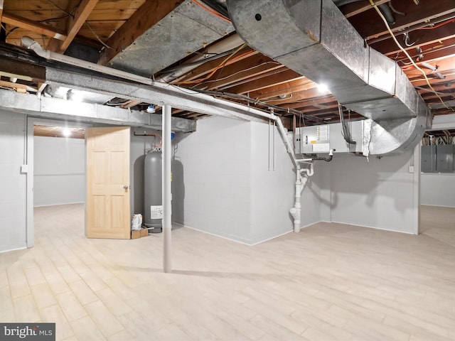 basement with hardwood / wood-style floors