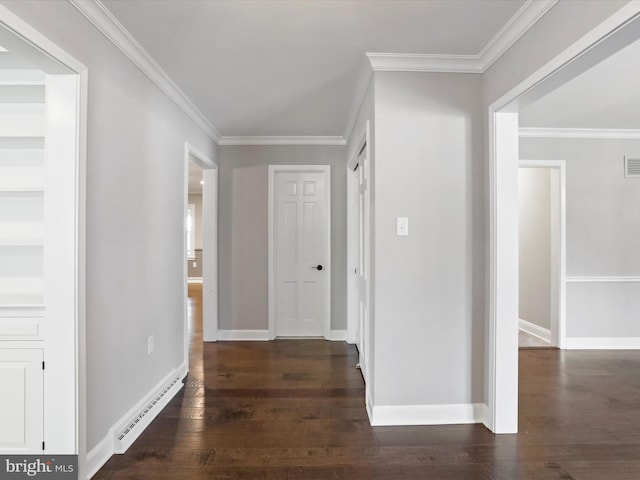 corridor with baseboard heating, dark hardwood / wood-style floors, and crown molding