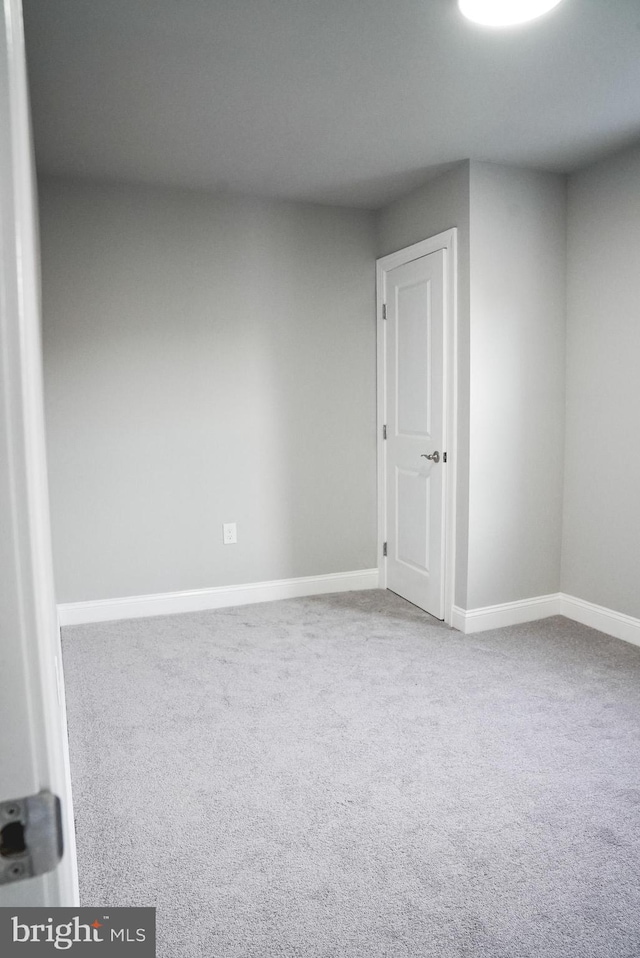 empty room with carpet floors