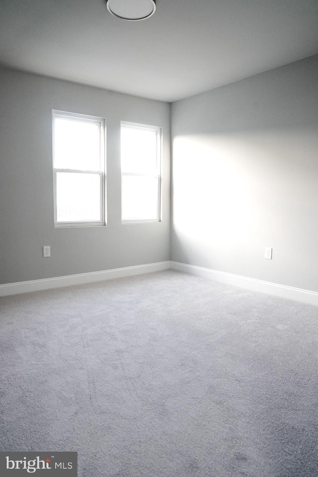 spare room with carpet flooring