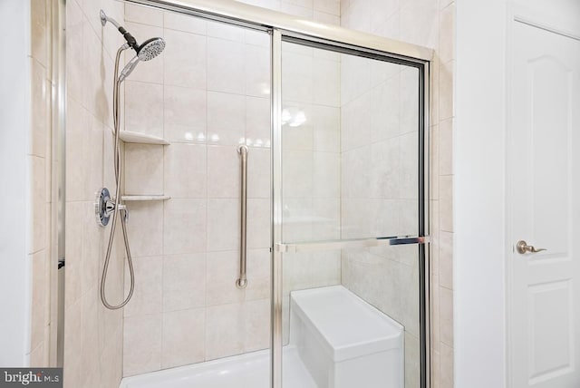 bathroom with an enclosed shower