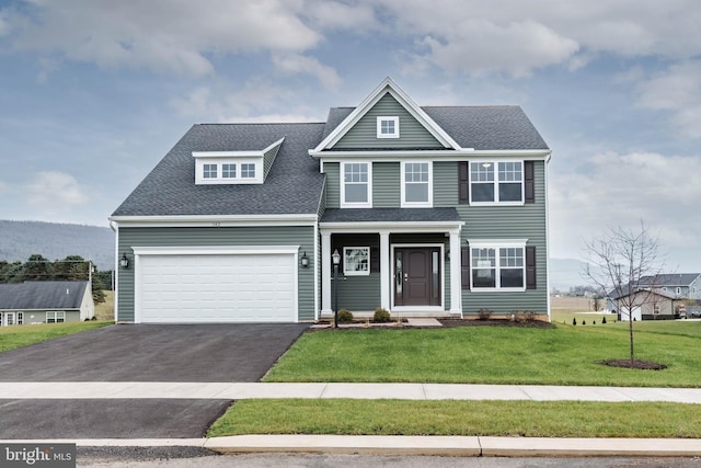 view of front facade with a front lawn