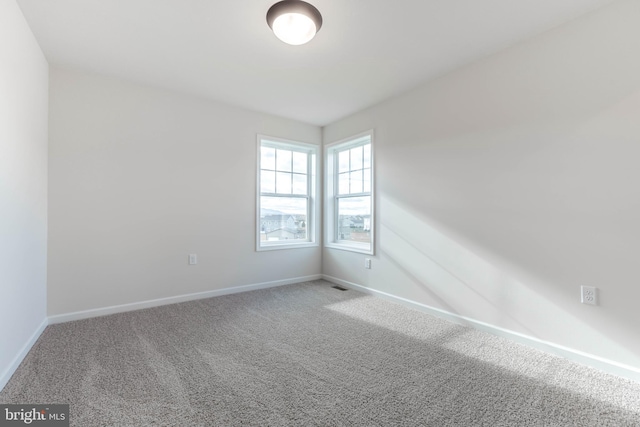 view of carpeted spare room