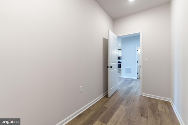 hall featuring hardwood / wood-style floors