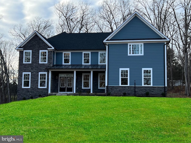 view of front of home with a front lawn