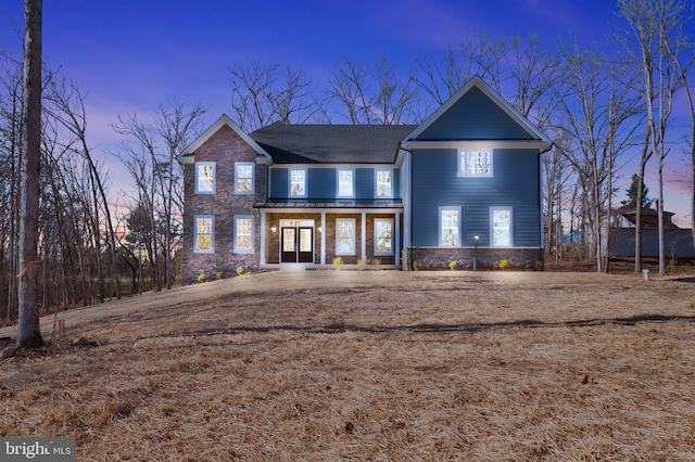 view of front of house with french doors