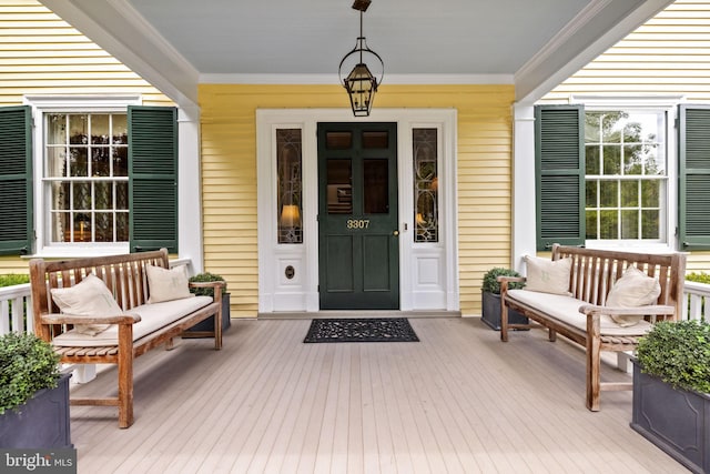 property entrance featuring covered porch