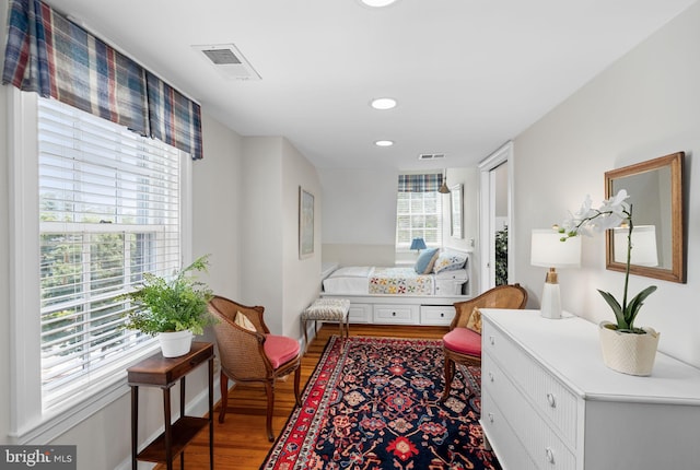 bedroom featuring hardwood / wood-style floors