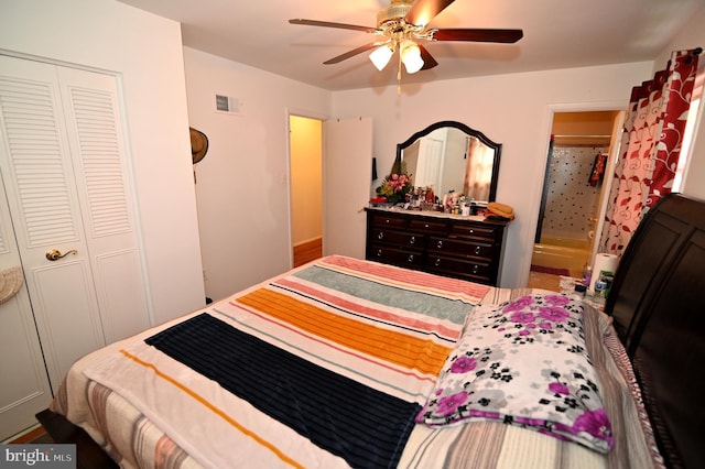 bedroom featuring visible vents, a closet, and ceiling fan