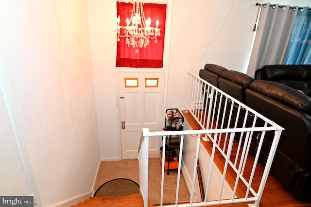 stairway featuring baseboards