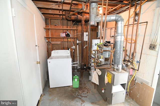 utility room featuring washer / dryer