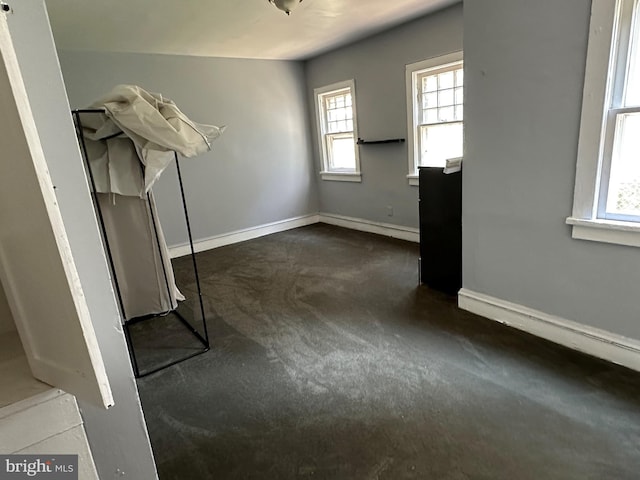 unfurnished bedroom featuring carpet flooring