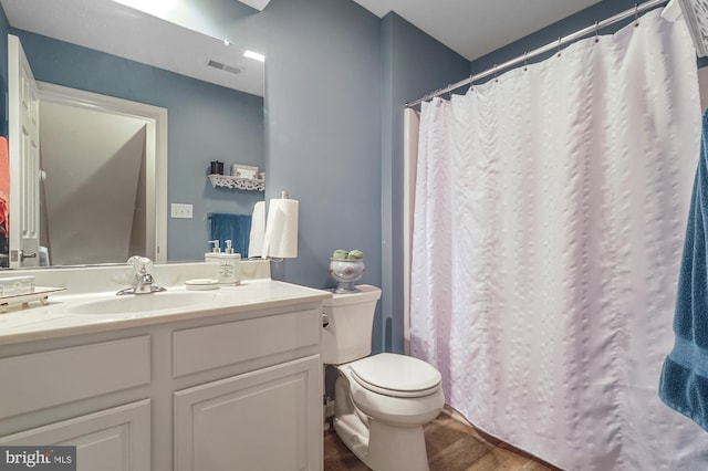 bathroom featuring vanity, a shower with curtain, wood-type flooring, and toilet