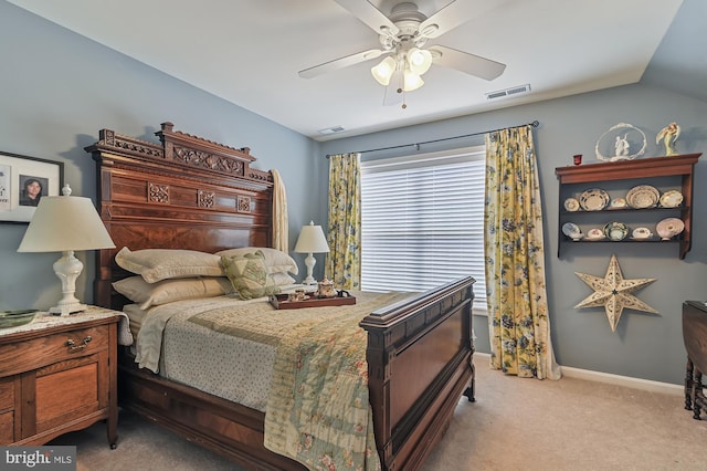 bedroom with light carpet, lofted ceiling, and ceiling fan