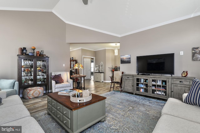 living room featuring ornamental molding, lofted ceiling, and dark hardwood / wood-style flooring