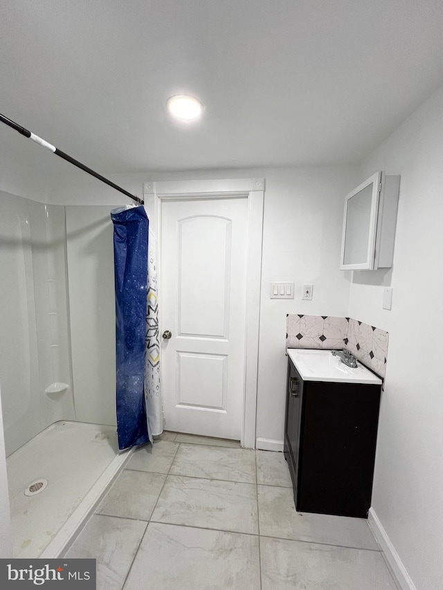 bathroom with vanity and a shower with curtain