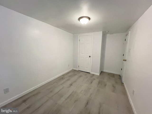 unfurnished room featuring light hardwood / wood-style flooring