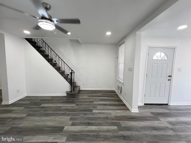 entrance foyer with ceiling fan and dark hardwood / wood-style floors