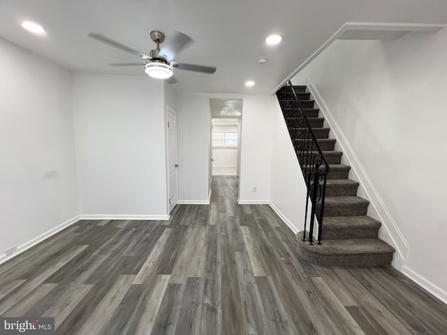 interior space featuring ceiling fan and dark hardwood / wood-style flooring