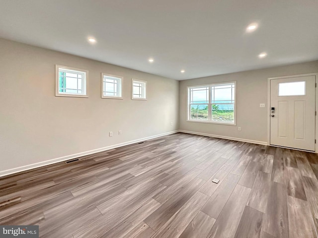 interior space with hardwood / wood-style floors