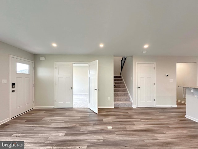 foyer entrance featuring light wood-type flooring