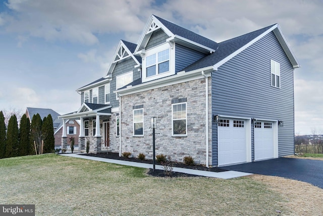 view of home's exterior with a garage, a lawn, and covered porch