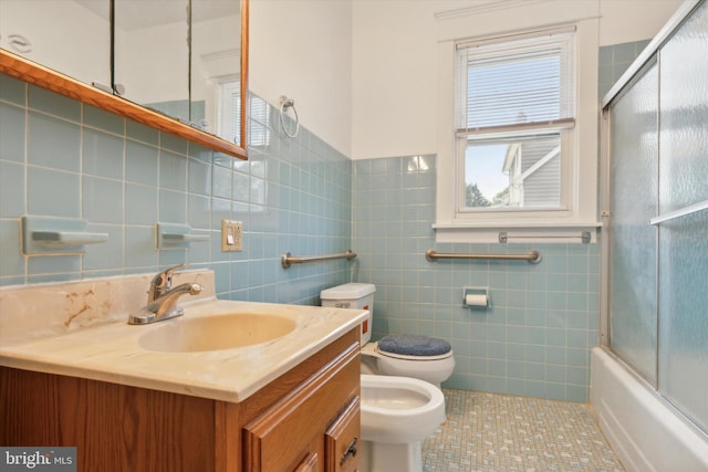 full bathroom with toilet, tile patterned floors, vanity, decorative backsplash, and tile walls