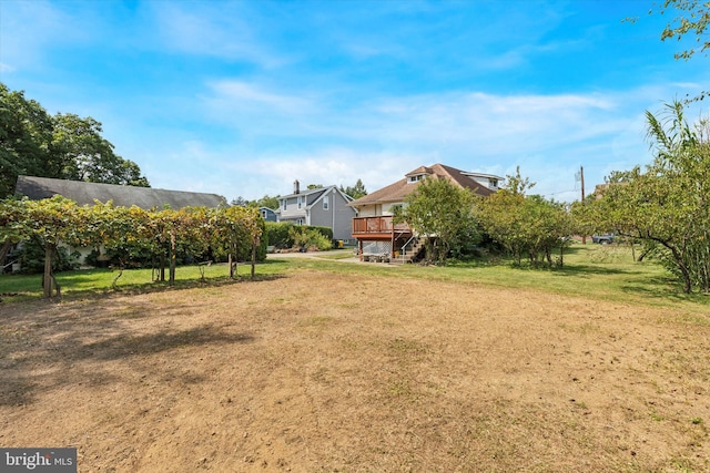 view of yard featuring a deck