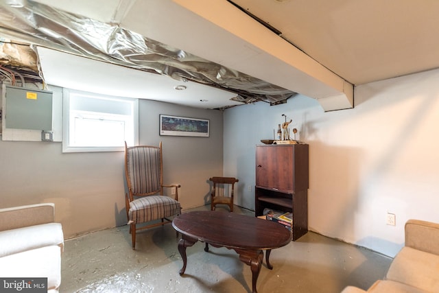 living area featuring concrete floors